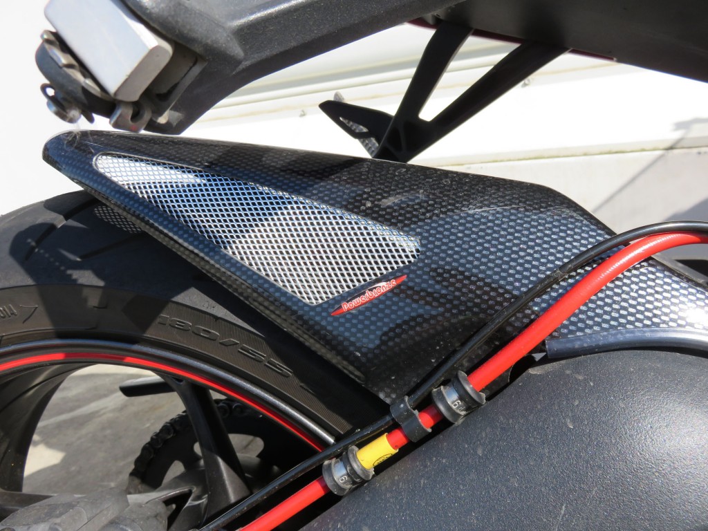 Hel Performance braided rear line in red on a Daytona 675R with Powerbronze hugger