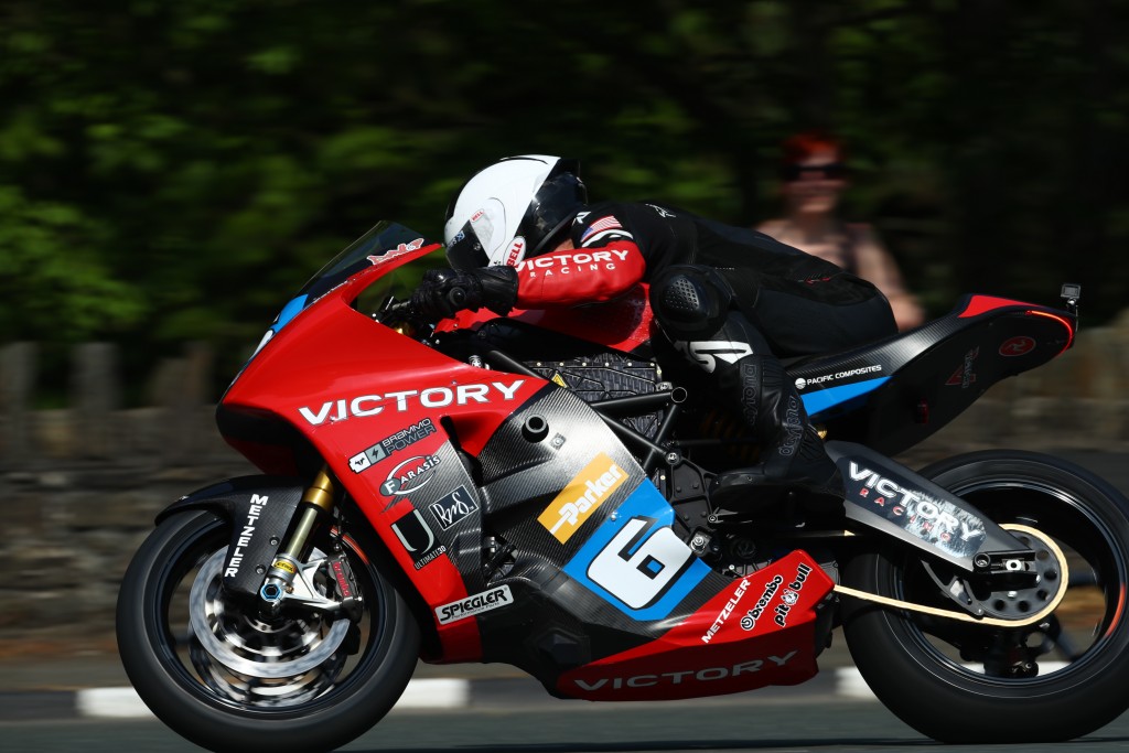 Victory Racing has surged to a podium finish at the SES TT Zero after William Dunlop rode a 115.844 mph lap to take second place.