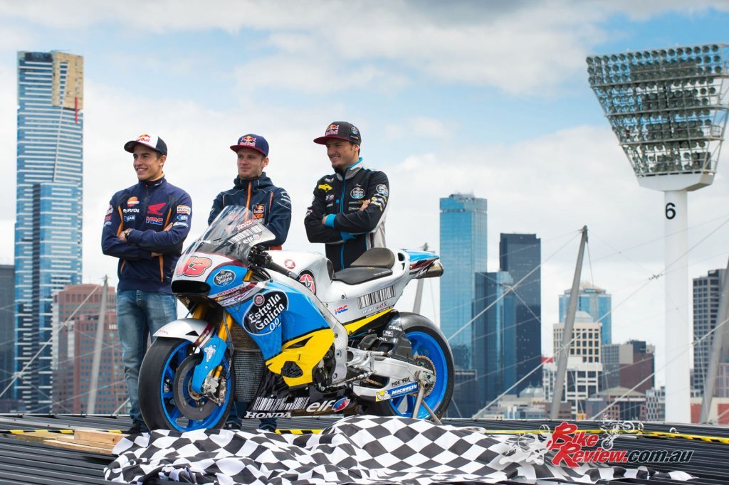 Miller, Marquez and Moto3's Brand Binder on the roof of the MCG with Miller's MotoGP machine.