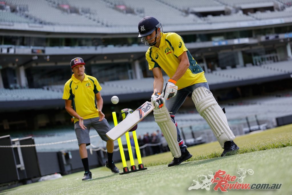 Triple World MotoGP Champion Marc Marquez batting at the MCG, with Aussie Jack Miller at the wickets.