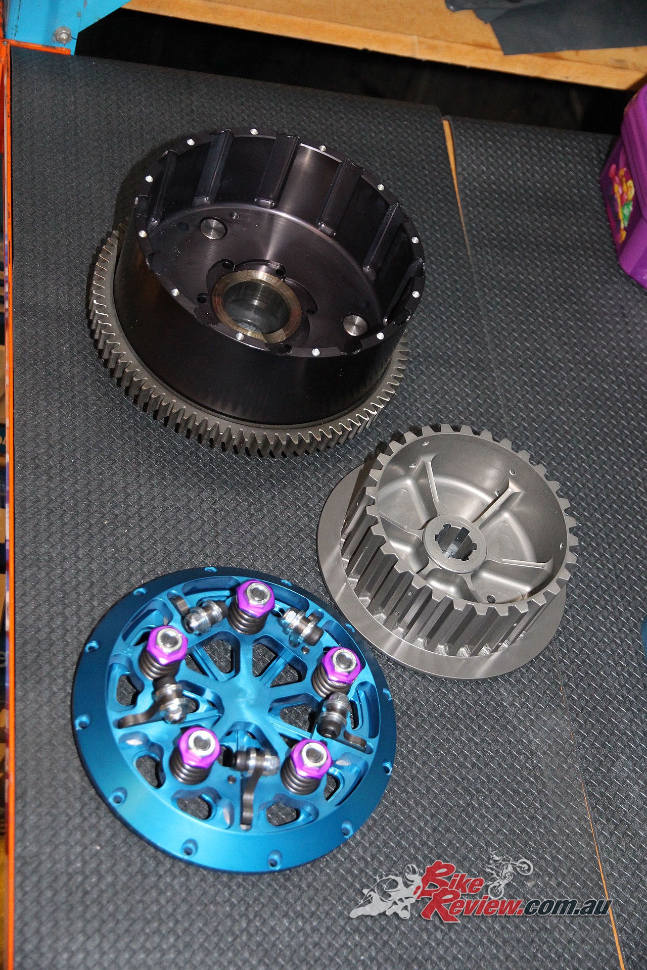 FROM THE TOP: Clutch basket, inner hub and slider hat and pressure plate. Anodised MTC billet goodness.