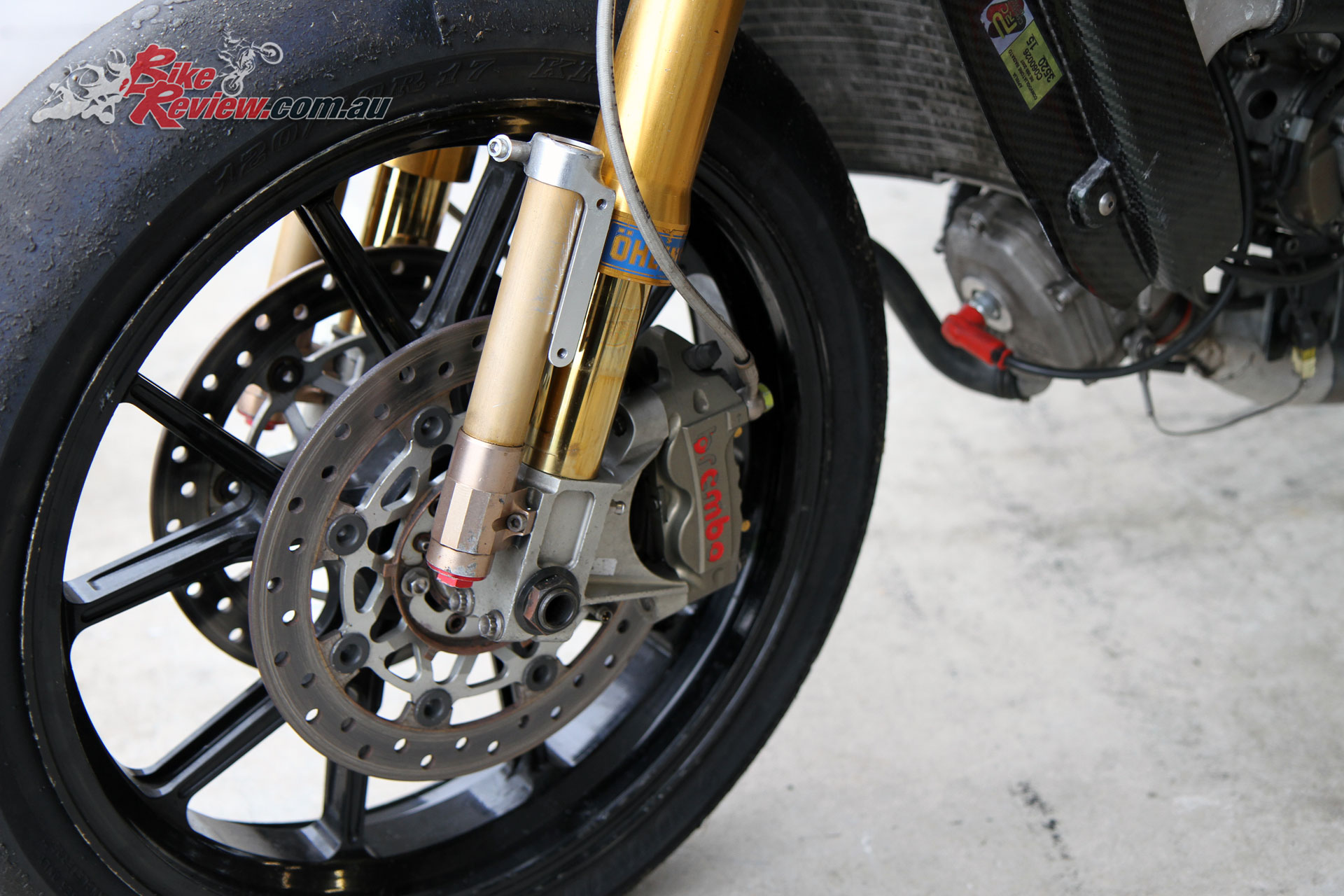 Ohlins forks with external chambers.