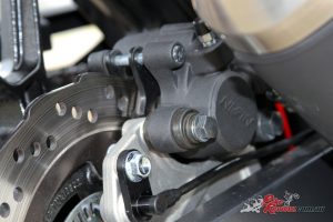 The rear brake is a Nissin caliper on petal disc, but isn't overly strong or sensitive, making for an easy experience for learners. It also reduces the occurrence of rear ABS activation that can plague bikes with more rear bite.