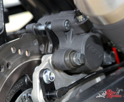 The rear brake is a Nissin caliper on petal disc, but isn't overly strong or sensitive, making for an easy experience for learners. It also reduces the occurrence of rear ABS activation that can plague bikes with more rear bite.