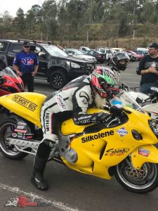 In the staging lanes waiting for the first pass.