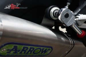 Add the bolt to the upper mounting point off the rearset, with the appropriate spacer and grommet.