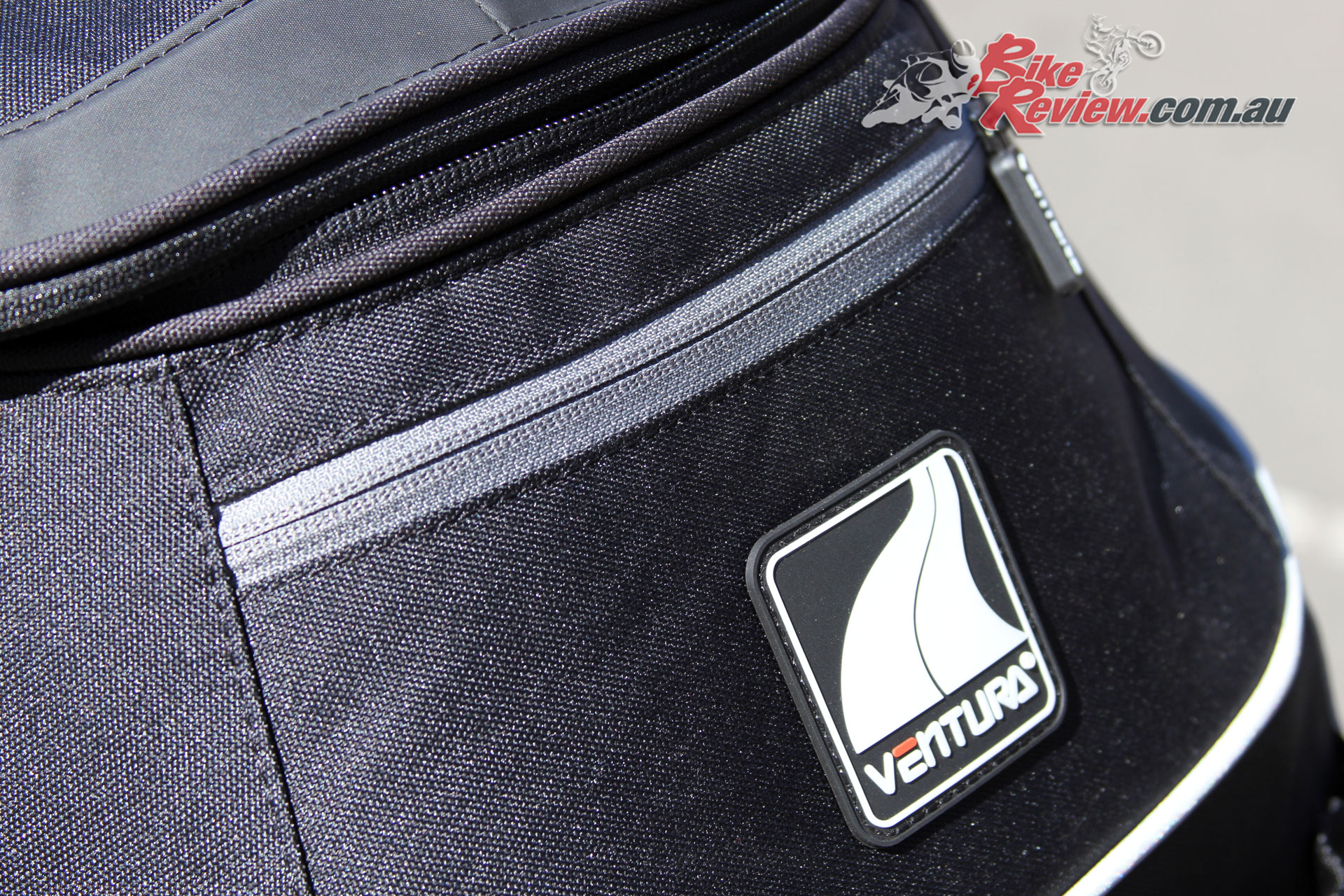A rear pocket offers easy storage and access to small items on the EVO-22 bag