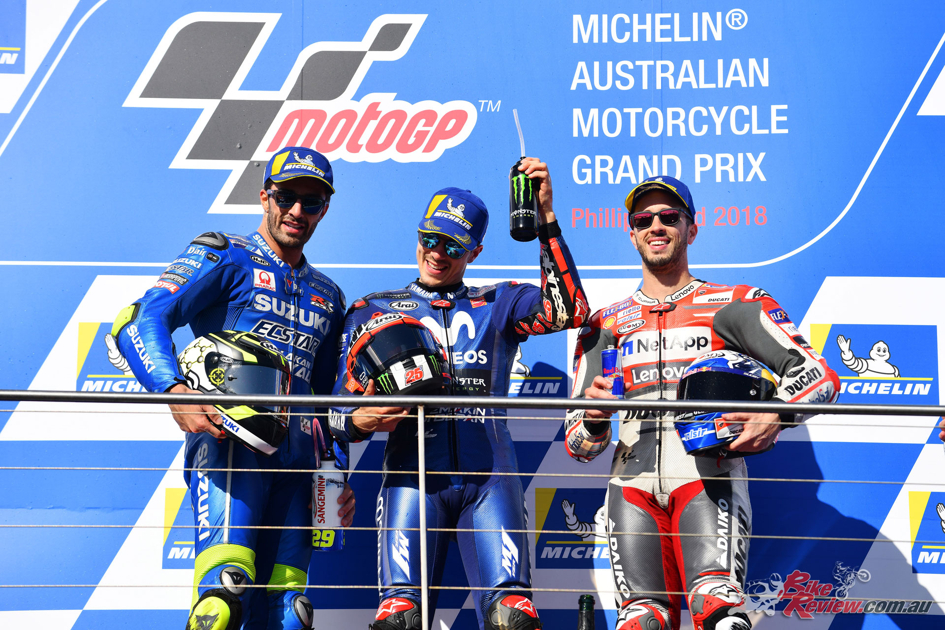Maverick Vinales claims the win from Iannone and Dovizioso