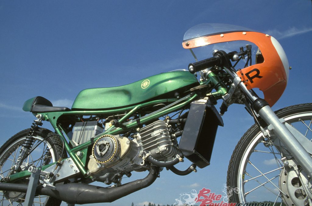 The tubular steel spaceframe is ulra lightweight. The engine is underslung. Check out the tiny crankcases...