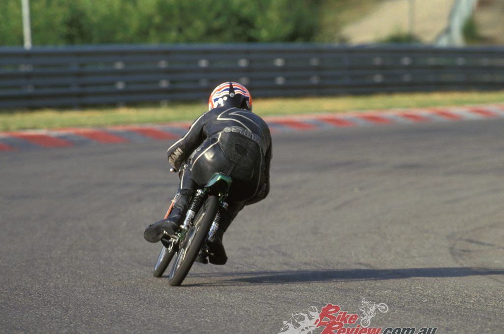 "Does my arse look big on this"... Sir Al doing his best to avoid rolling the Michelin rear tyre off the 2.50in rim...