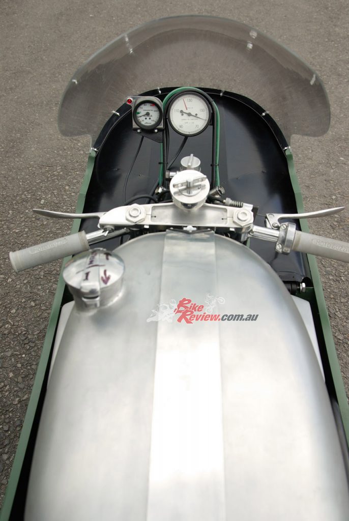 "An astronomic 15,000rpm, with a red line painted at the safe 12,500rpm redline which Guzzi V8 riders were asked to observe, flanked on the left by a small Acqua temp gauge with a dab of green paint at 60º and a red one at 90º".
