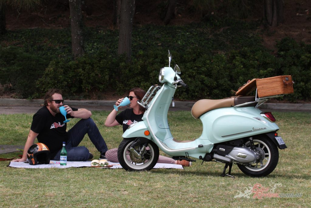 Heather and Jeff Ware, reliving the old days of picnics on their own scooters, with a day in the sun on the Vespa Premavera Pic Nic...