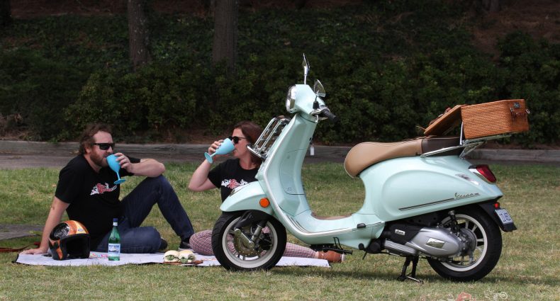 Heather and Jeff Ware, reliving the old days of picnics on their own scooters, with a day in the sun on the Vespa Premavera Pic Nic...