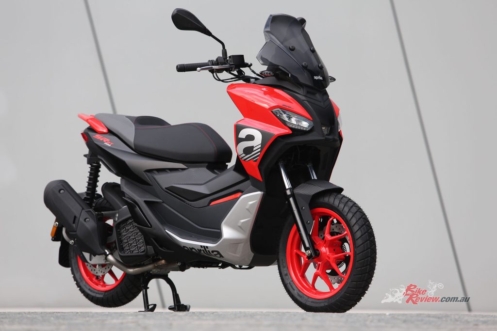 The side fins were inspired by Aprilia's Tuono range. Infact, the whole front end looks like a sportsbike.