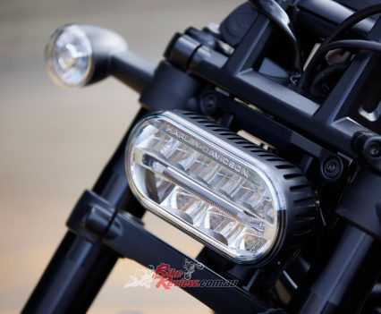 Stunningly styled headlight directs wind away from the rider.