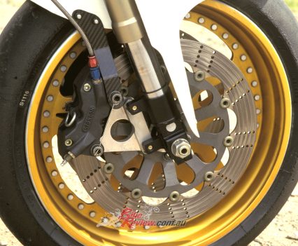 Spondon brakes, using their own four-pot calipers on stainless steel discs.