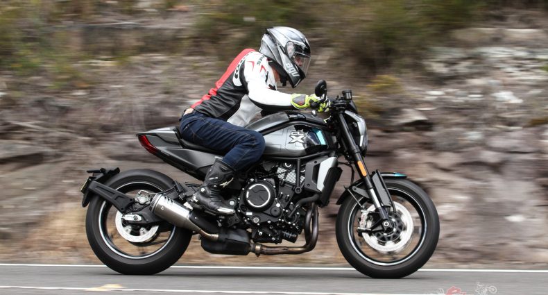 "Sliding one’s derriere across the seat a little and placing more weight on the inside ‘peg in the bends produces a good feeling in the way the bike tracks."