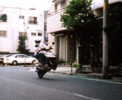 He had a two-stroke Yamaha 100 scooter in Tokyo in 1999 that went pretty well but never got time to hot it up.