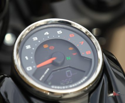 4-inch analog tachometer with digital speedometer.