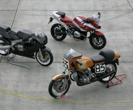 The BMW R1 Desmo with the 1976 Daytona-winning R90S and the production R1200R machine.