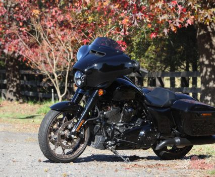 The Street Glide ST has a smaller headlight too. It's just a matter of personal preference.