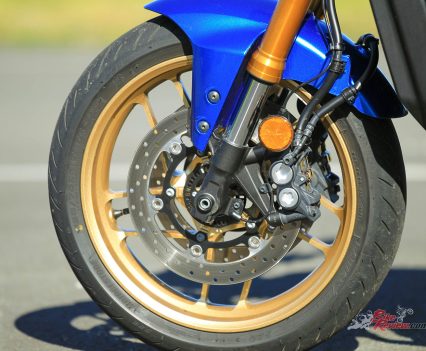 Twin 298mm discs with four-piston calipers, Brembo master-cylinder, cornering ABS.