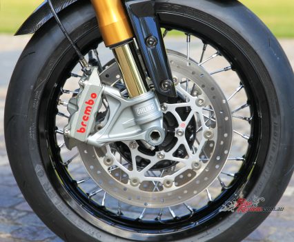 Four-piston radial monobloc calipers with twin floating Brembo discs.