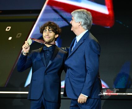 ...and Bastianini ultimately took third overall, pictured with FIM President Jorge Viegas.