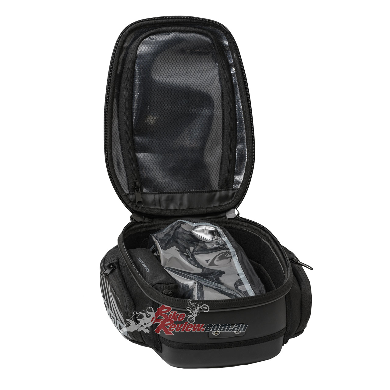 The M1 tank bag is a fixed 8L volume tank bag. The top is made from single shot molded PU with Carbon Fiber graphics and the bottom is a single shot molded PU with matte finish.