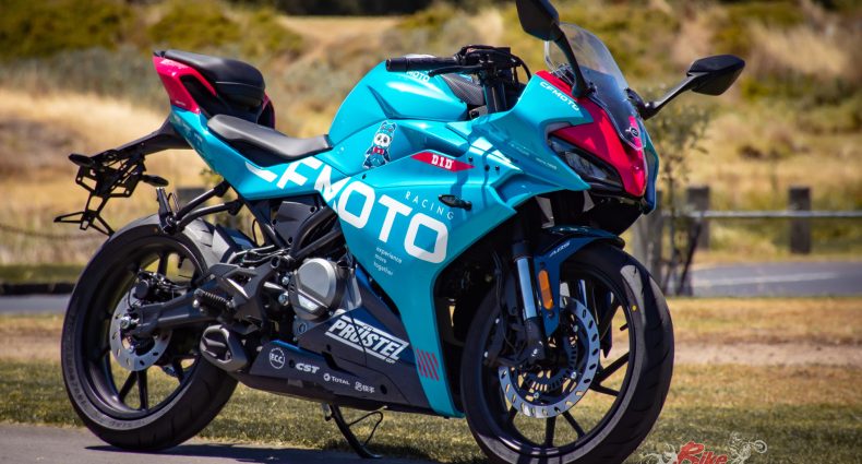 CFMOTO has released a special iteration of its first fully faired sports bike, the inimitable 300SR adorning the official PrüstelGP Moto3 team Tosca green, pink and blue livery.