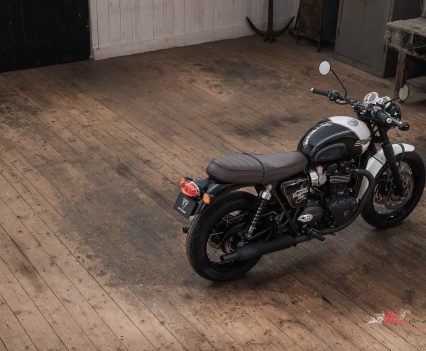 The DGR T120 Bonneville is designed with a stylish DGR metallic black and white paint scheme, featuring official DGR branding with a custom logo on the tank and side panels, gold detailing and distinctive brown seat.
