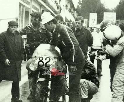 1975 Aug. - Spa 24h 3C 1000 Gallina-Cereghini pit stop with Piero Laverda holding bike.