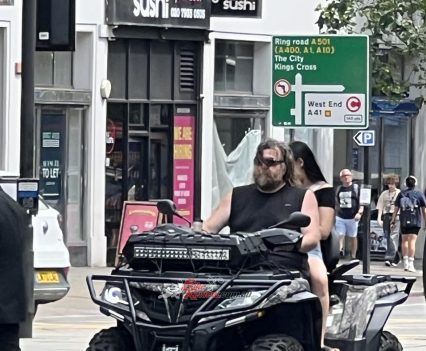 People just ride around here with no lid on a registered quad, this was in the middle of London.