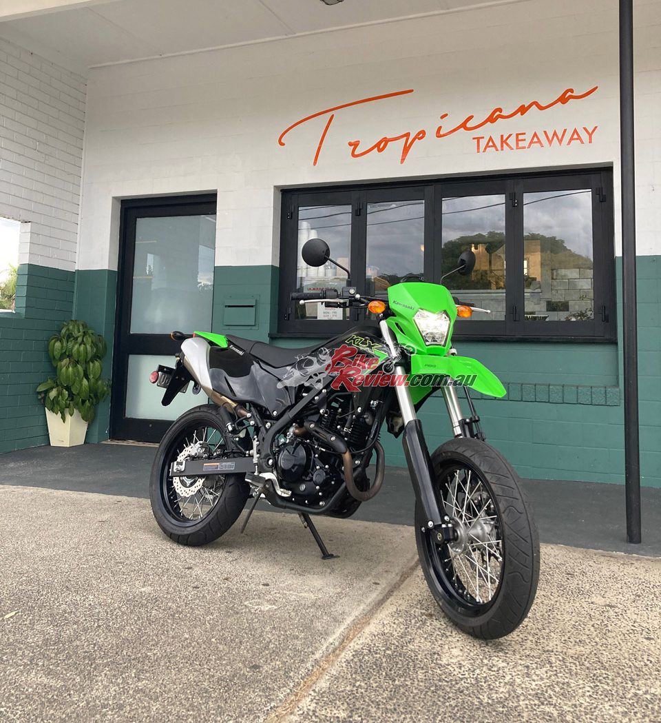 The KLX230SM is all about fun, so I snapped this shot of it with my iPhone, parked out the front of what was once my childhood corner shop where I spent many afternoons playing Wonder Boy and Rastan Saga!