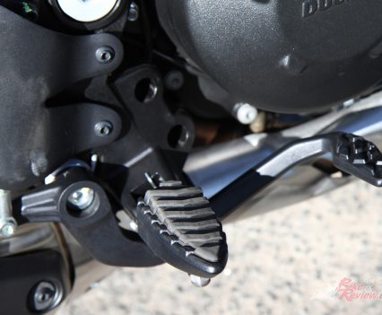 Small rubber topped steel grip footpegs are different.
