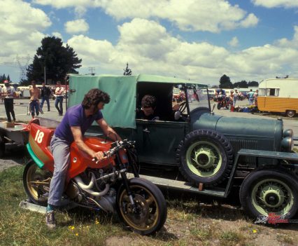 Allan Wylie sitting on the Britten Aero-D-One with Mike Sinclair sitting in the ute.