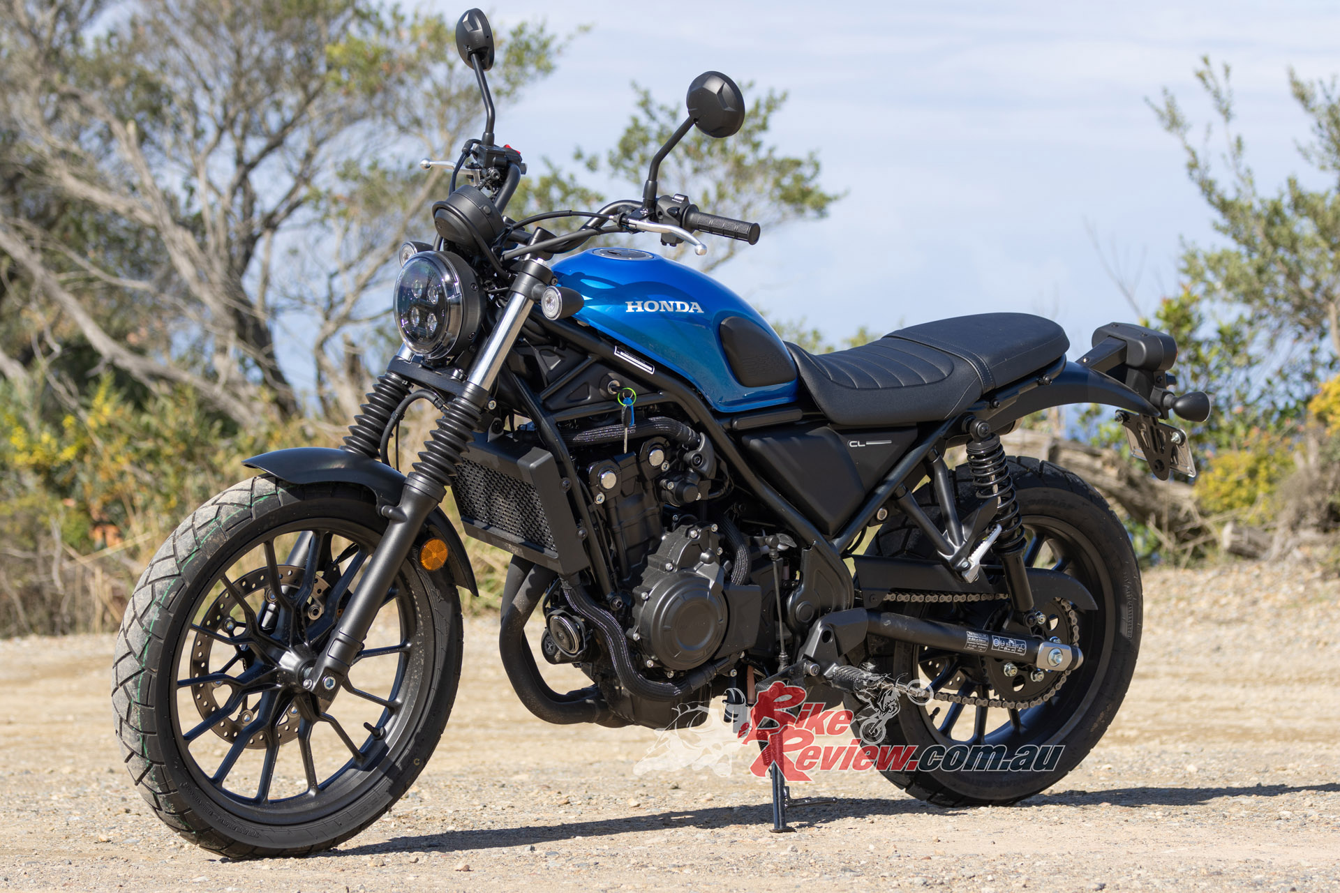 "Styling-wise – it looks damn cool, I won't lie. Regardless of the exhaust, the blacked-out powertrain frame complements the minimal styling and retro-style dash gauges with a side ignition barrel."