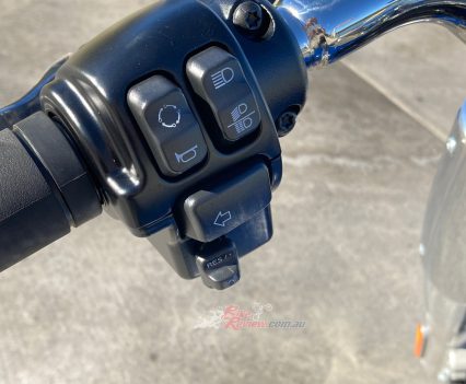 Standard H-D issue left switchblock, cruise control comes standard on the Fat Boy.