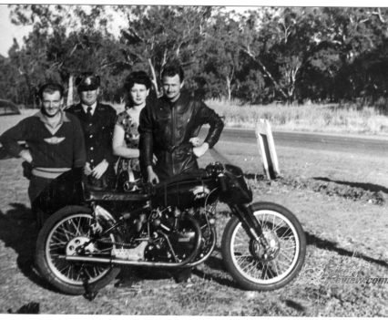 Jack Ehret with wife Audrey and Gunnedah police sergeant Noel Bailey after breaking the record at Gunnedah in January 1953.