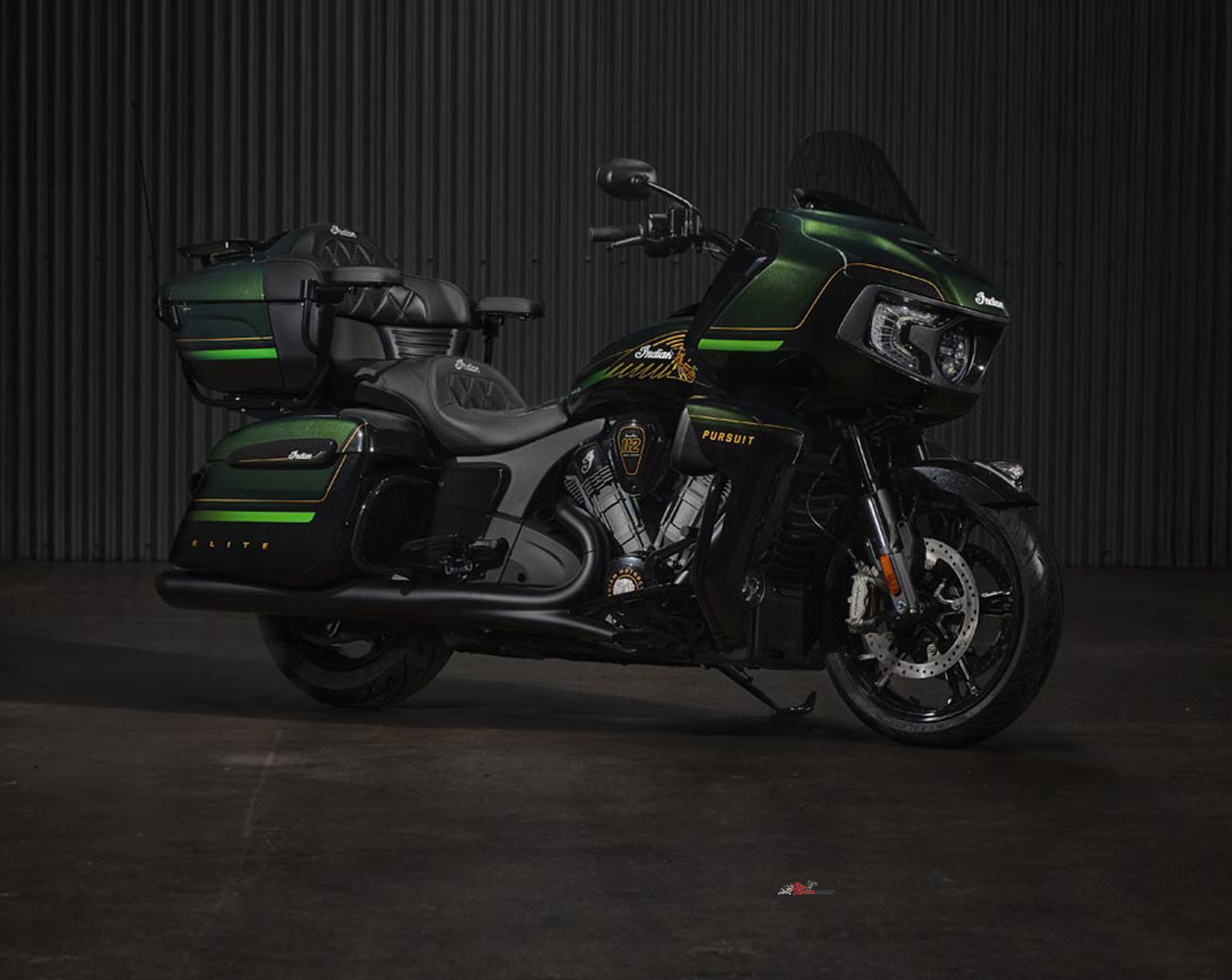 Indian Pursuit Elite: Tri-tone finish in Black Candy and Black Forest Candy with hand-painted Championship Gold accents. $65,995 Ride Away.