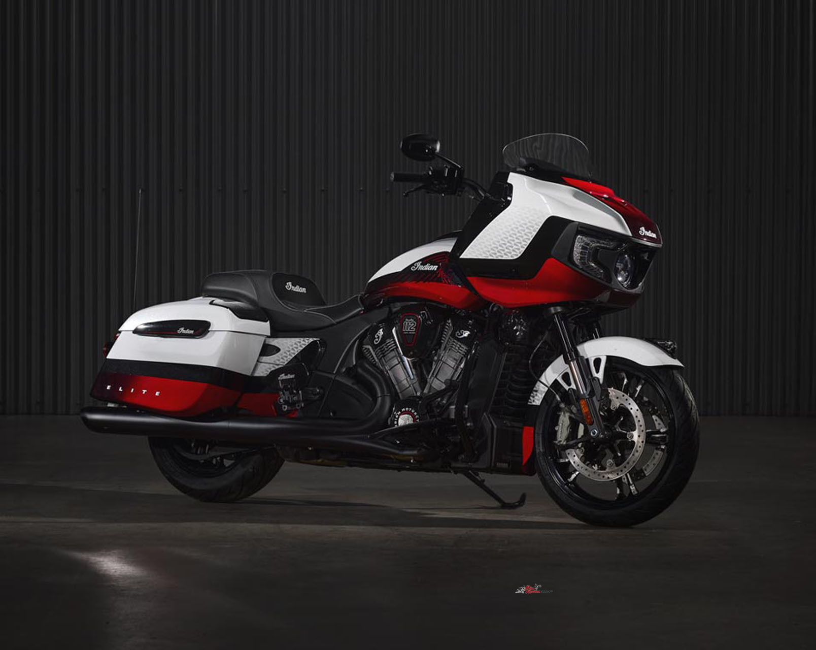 Indian Challenger Elite: Tri-tone finish in Crystal White Pearl Satin with Black Candy and Red Candy layers. $57,995 Ride Away.