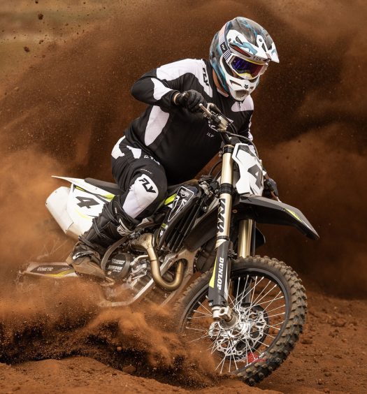 "The 'bars are set at an ideal height for a balanced riding posture, and the footpegs finish off a rider triangle that allows for aggressive cornering without compromising comfort."