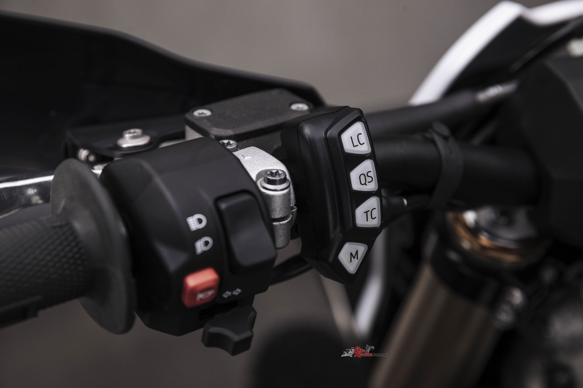 Launch Control, Quick-Shift activation, Traction Control and Ride Mode buttons are on the left block, plus for the E models, the lights and horn.