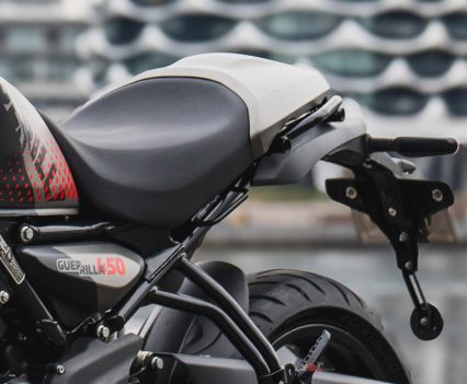 The rear seat cowl is one of the Apex’s clearest visual changes, giving the Guerrilla a neater, more focused tail section.
