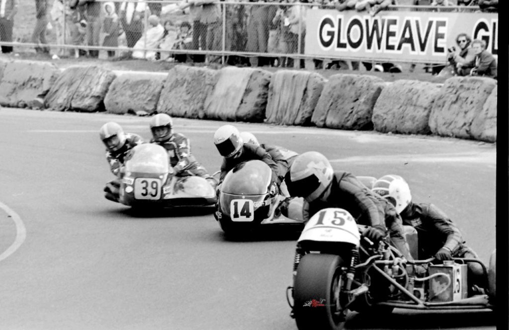 Sidecars in action at Calder Park, who needs safety air-fencing when you have rocks?! 