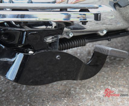 The foot-operated parking brake acts on both rear wheels to secure the trike when stopped.
