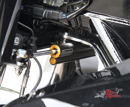 Steering is controlled by an Öhlins damper, helping manage the forces generated by the wide chassis.