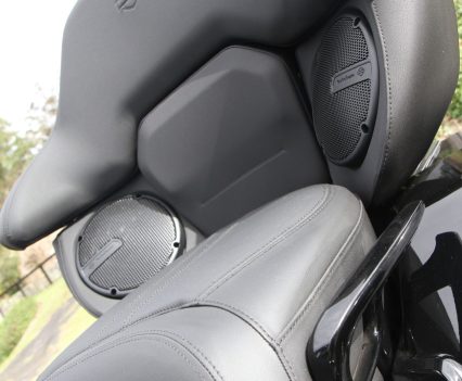 The Grand Tour-Pak incorporates passenger speakers as part of the four-speaker audio system.