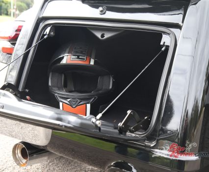The lower trunk provides substantial storage, with room to swallow a full-face helmet.