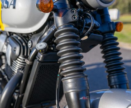 Fork gaiters help sell the retro look while protecting the stanchions.